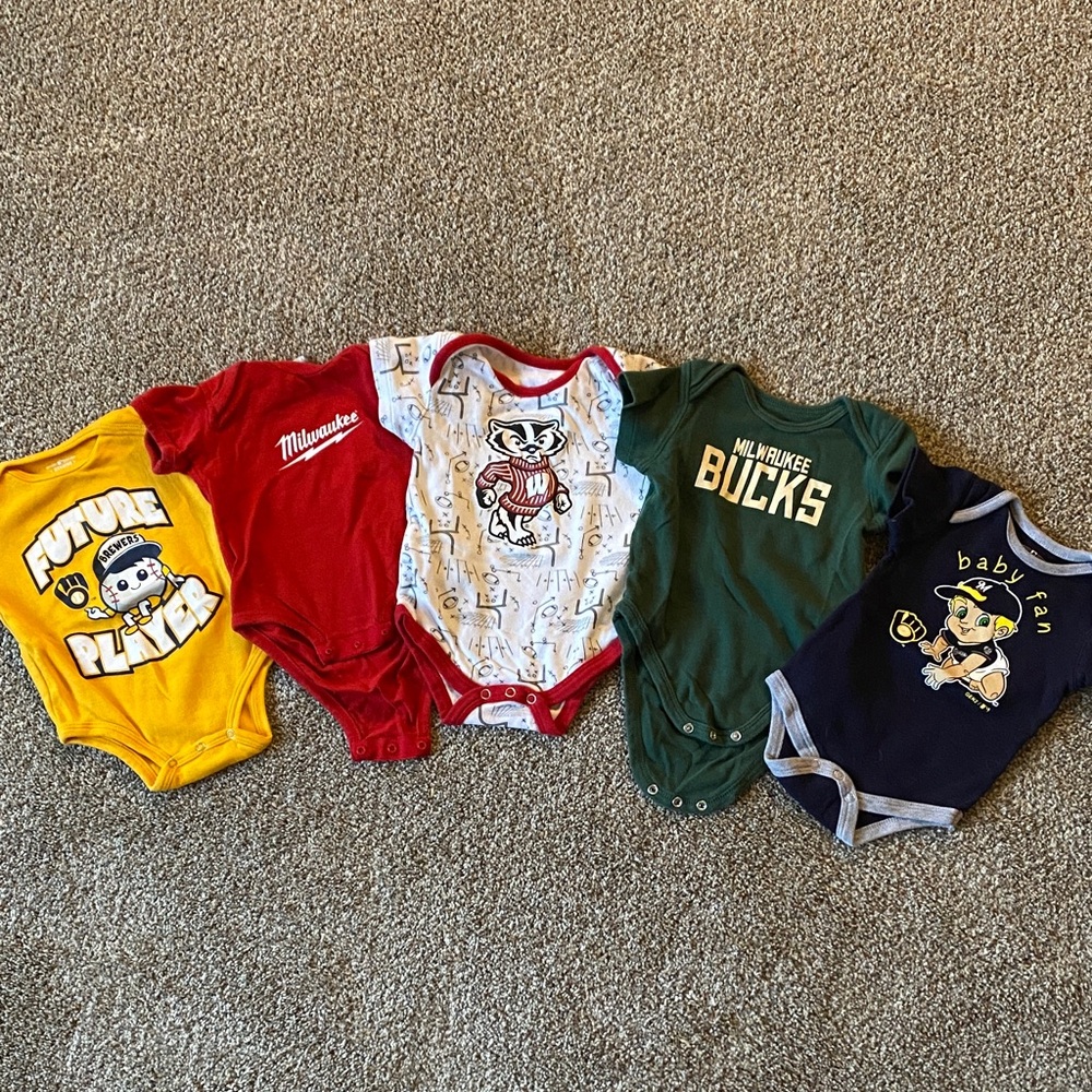 6-9 Month Wisconsin sports team onesies.